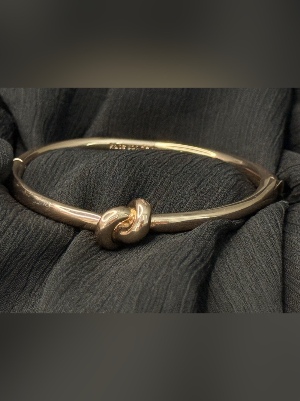Like New! Polished rose gold-tone Kate Spade Sailor's Knot Hinge Bangle